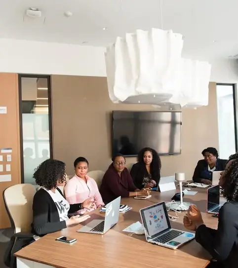 Team of African professionals in a boardroom meeting